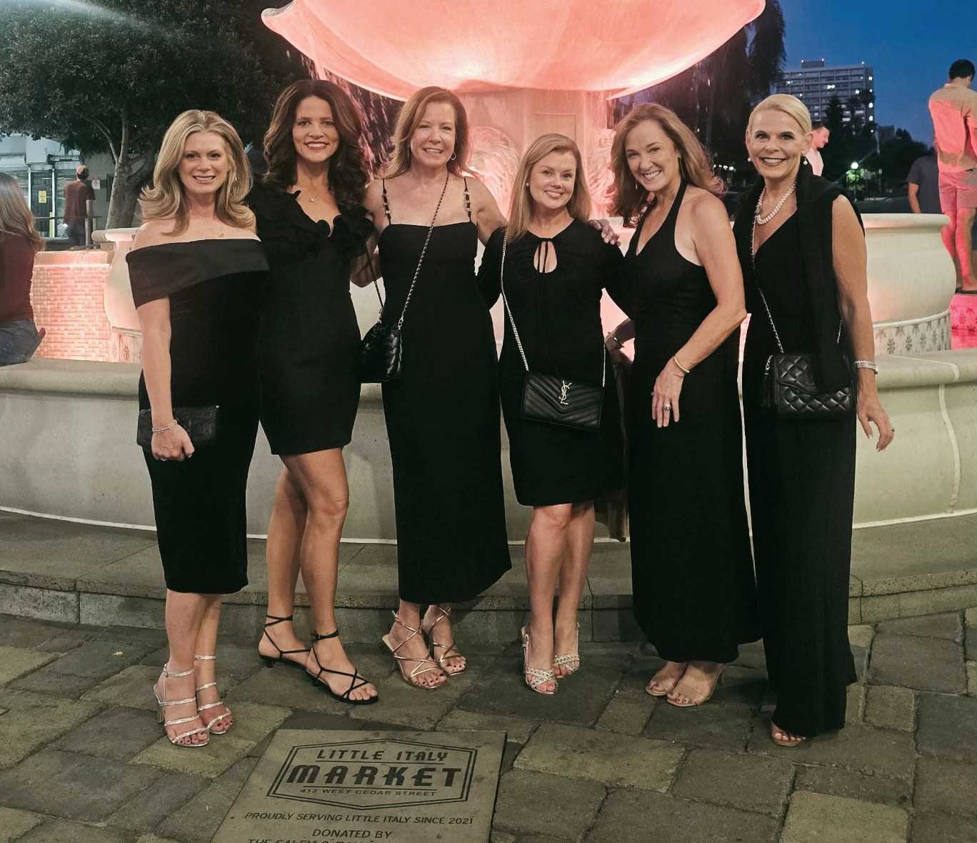 Six real friends dressed in black for a night out together
